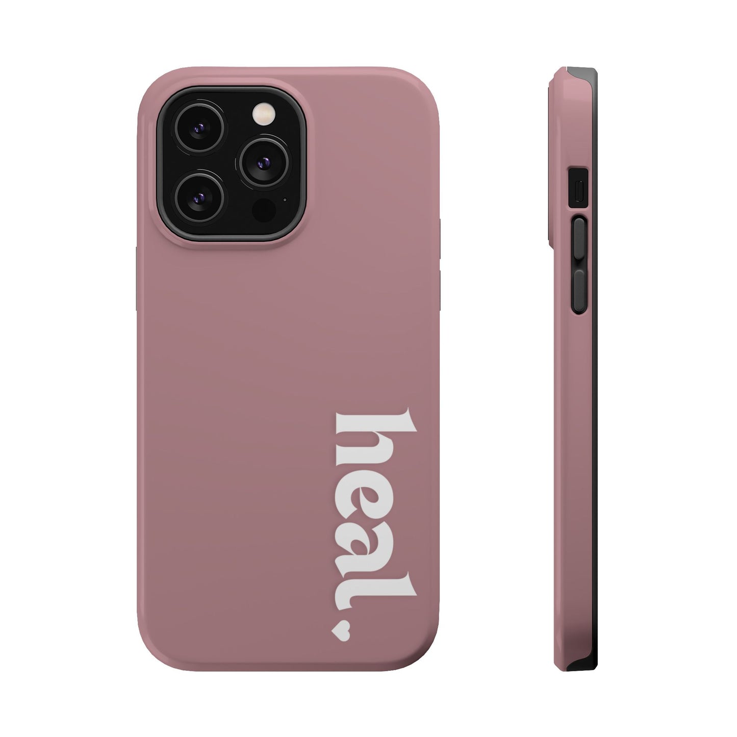 A person wearing a red sweater holding a pink iPhone case with the word 'heal' printed on it.