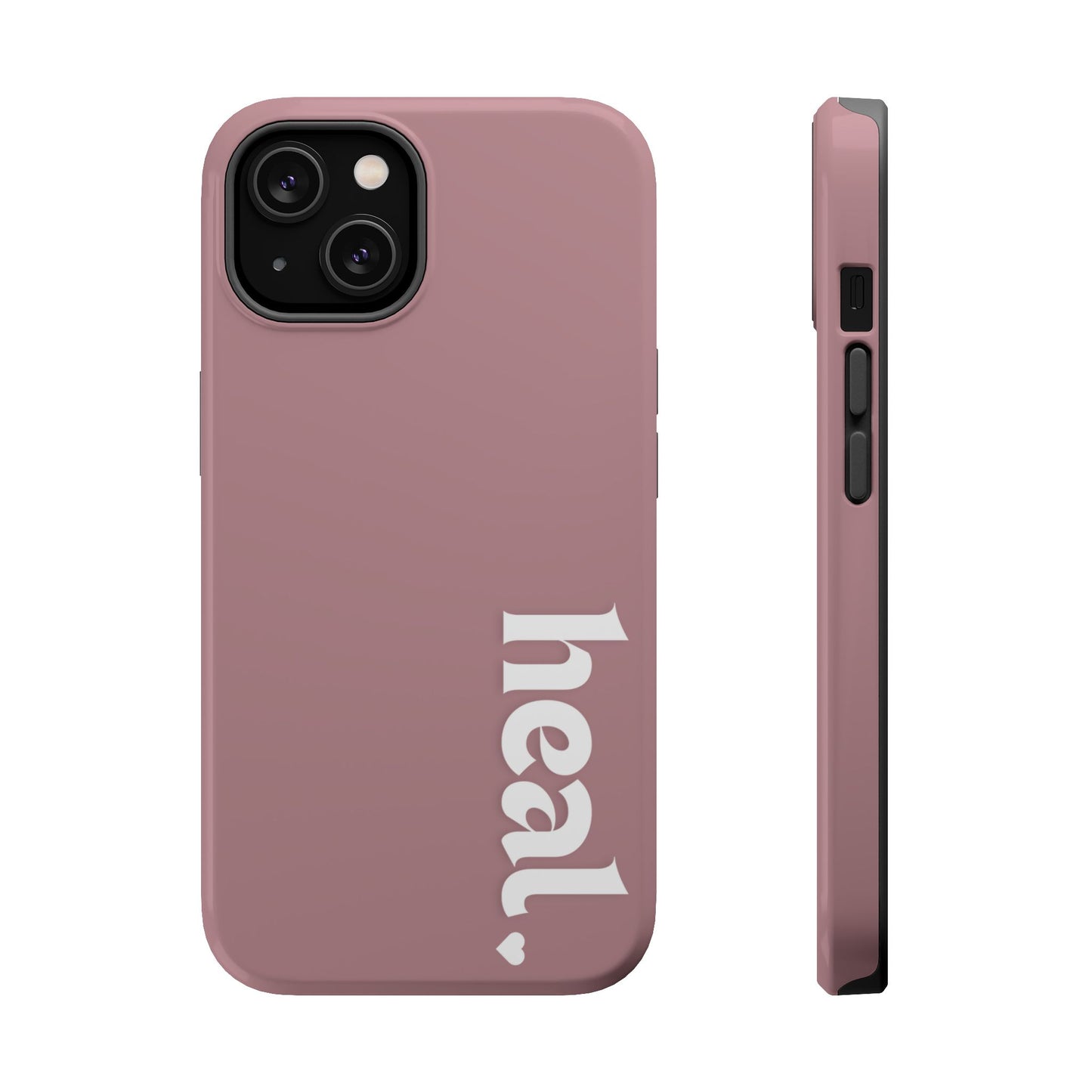A person wearing a red sweater holding a pink iPhone case with the word 'heal' printed on it.